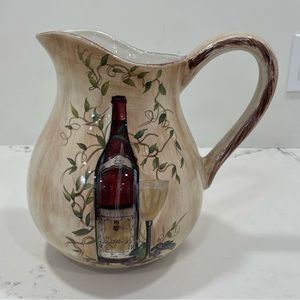 Pitcher with design on both sides